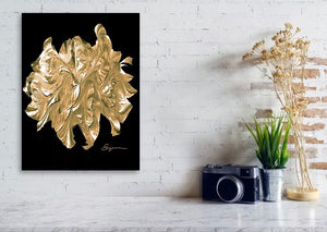 a picture of a gold leaf on a black background